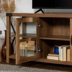 Sophie Rustic Farmhouse X Frame Glass Doors TV Stand For TVs Up To 80" Rustic Oak - Saracina Home 11 Sophie Rustic Farmhouse X Frame Glass Doors TV Stand For TVs Up To 80" Rustic Oak - Saracina Home -Saracina Home Shop GUEST 2d1619d6 6228 4a03 b8af 73592536e713