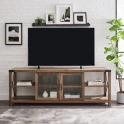 Sophie Rustic Farmhouse X Frame Glass Doors TV Stand For TVs Up To 80" Rustic Oak - Saracina Home 4 Sophie Rustic Farmhouse X Frame Glass Doors TV Stand For TVs Up To 80" Rustic Oak - Saracina Home -Saracina Home Shop GUEST 545c029e b94b 4a9e 81b6 ba58fc048e1b
