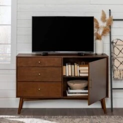 Mid-Century Modern With Closed Storage TV Stand For TVs Up To 58" Walnut - Saracina Home -Saracina Home Shop GUEST 559b40fb 3110 44b0 a6be ec4b539a5d7f