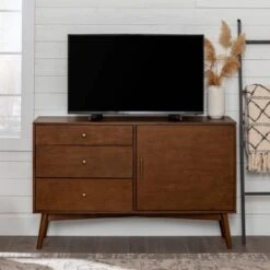 Mid-Century Modern With Closed Storage TV Stand For TVs Up To 58" Walnut - Saracina Home -Saracina Home Shop GUEST ad69daf9 9422 4902 8fb3 e11fa4db8721