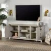Clarabelle Farmhouse Barn Door TV Stand For TVs Up To 60" - Saracina Home 1 Clarabelle Farmhouse Barn Door TV Stand For TVs Up To 60" - Saracina Home -Saracina Home Shop GUEST f8bb1c9d 5f34 40ac a578 f4cf621624f6