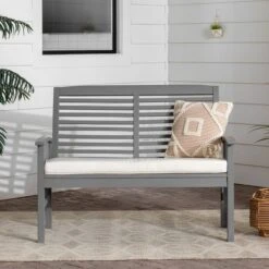 Ravenscroft Modern Boho Acacia Wood Slatted Outdoor Loveseat With Cushion - Saracina Home 10 Ravenscroft Modern Boho Acacia Wood Slatted Outdoor Loveseat With Cushion - Saracina Home -Saracina Home Shop GUEST f8d474ed ee58 4568 8446 360382d2da01